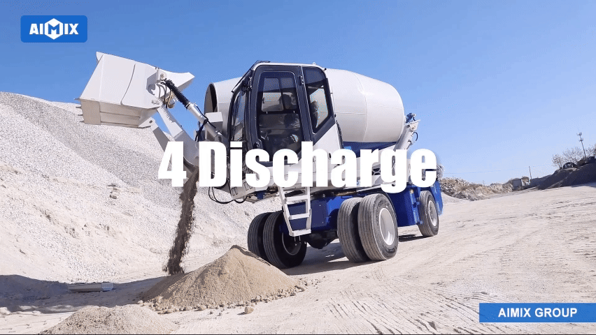 self loading concrete mixer discharing concrete mixture