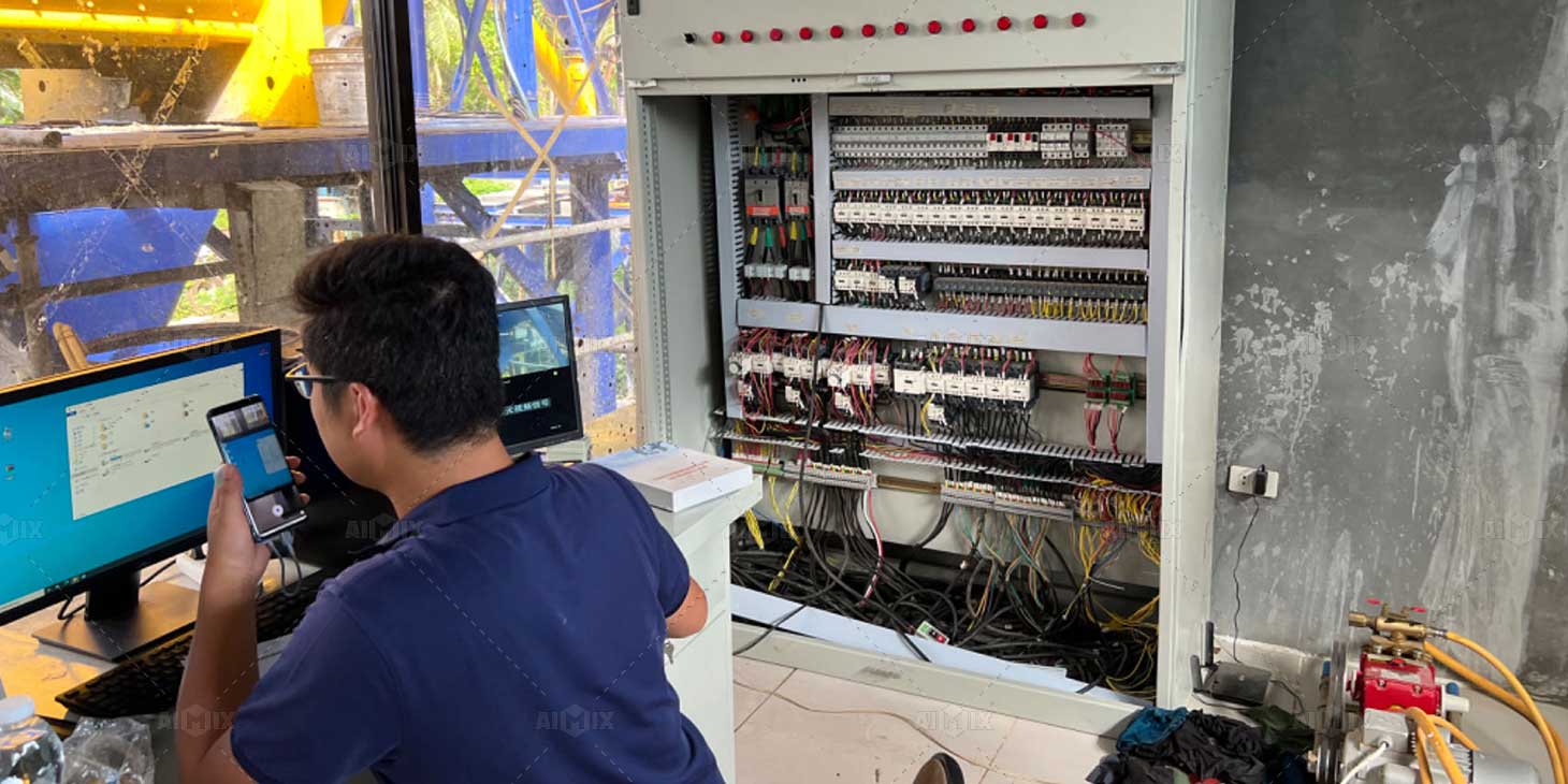 AIMIX Engineers Checking AJ60 Concrete Batch Plant Performance