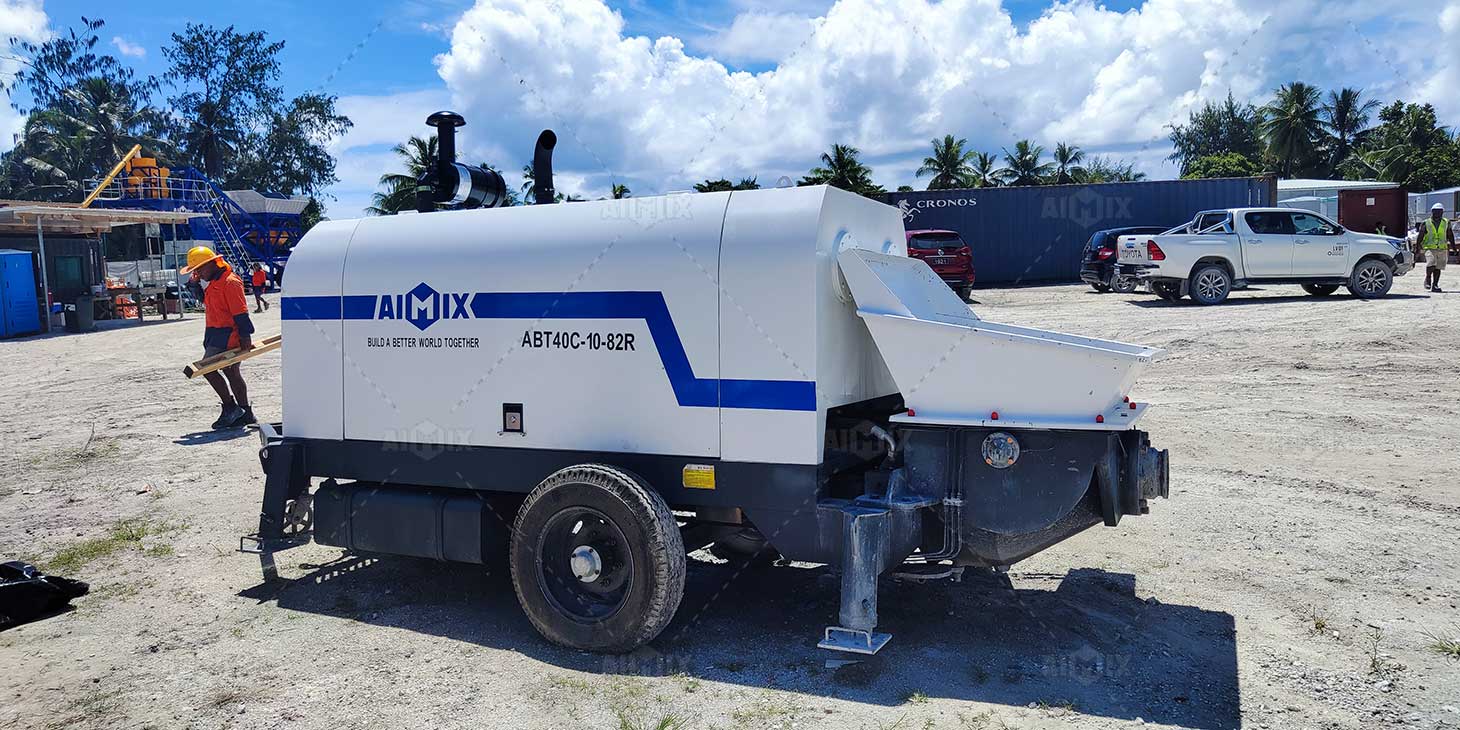stationary concrete pump working on-site