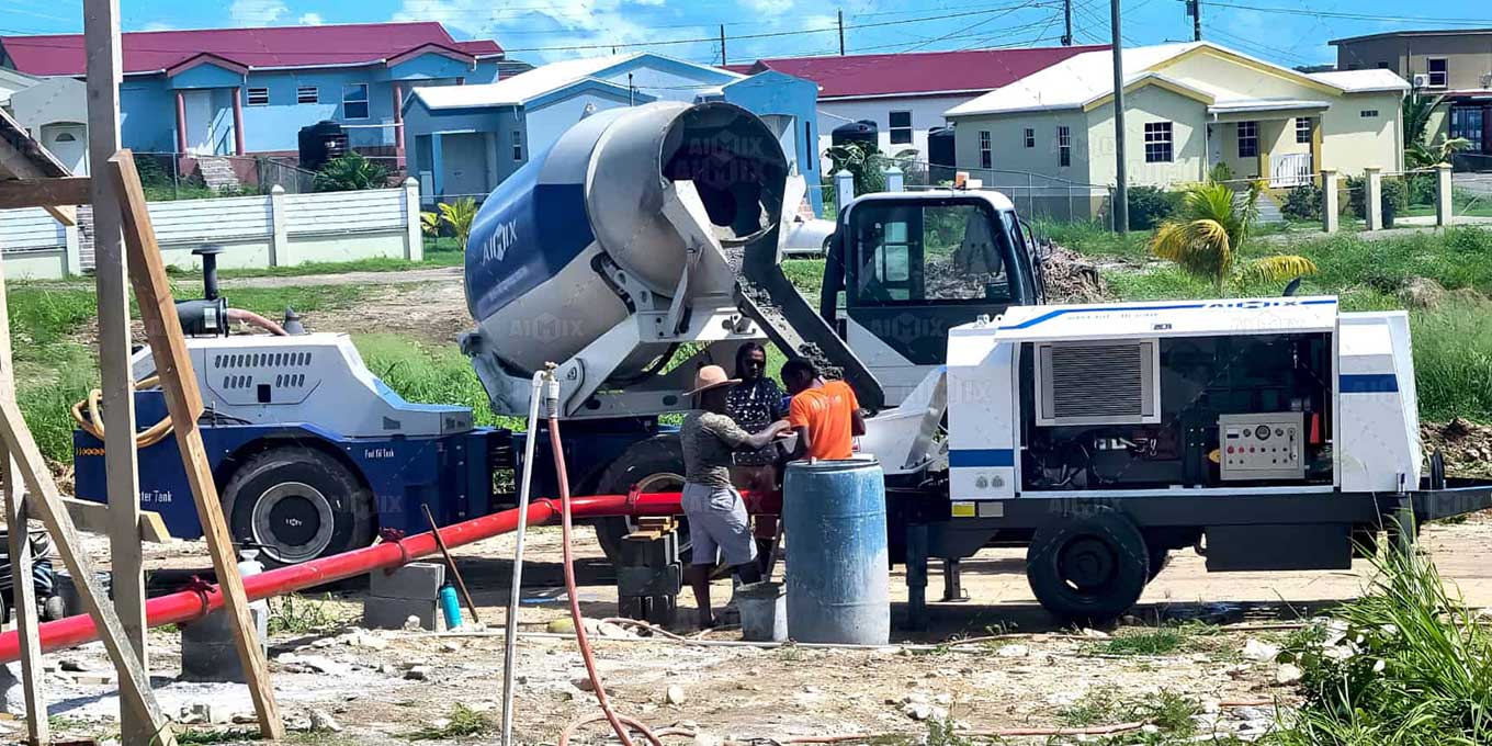 self loading mixer truck with line pumpcrete working for house construction