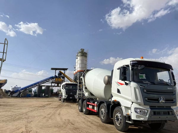 Concrete mixer truck delivering the mixture to sites